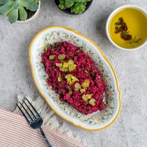 "Kısır" with Beetroot and Walnut

Bulghur, baked beet, pickled cucumber, walnut, cumin, pomegranate syrup and fresh herbs at Nevale Mutfak in Istanbul