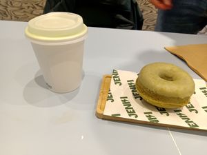 Flat green with matcha doughnut at Jenki in East London