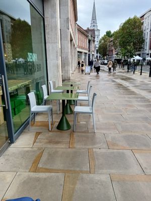 Outside seating area and Brushfield St entrance at Jenki in East London