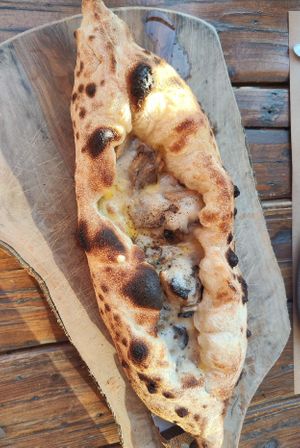 Peinirli with cheese and mushrooms at Ergon Agora in Thessaloniki