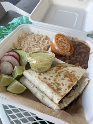 Carnitas Quesadilla Platter, which comes with rices and beans. Highly recommend, as the beans are delicious!!   at Calaveritas in Atlanta