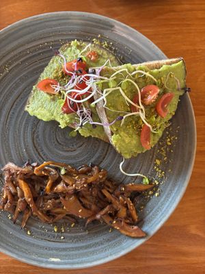 Avocado toast w/ mushroom   at Okapi in Neuchatel