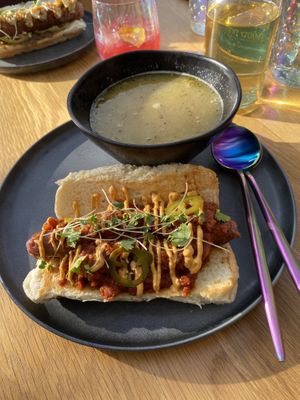 Chili Cheese Dog with a daily special of chicken noodle soup  at Good Dogs Plant Foods in Vancouver