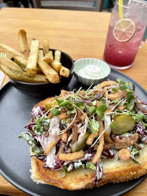 Dill hot dog with fries  at Good Dogs Plant Foods in Vancouver