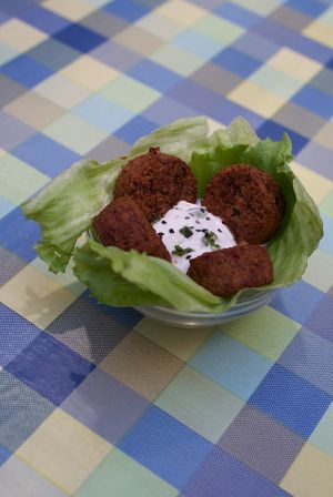 Homemade Black beans falafel with vegan tzaziki at El Rabipelao in Barcelona