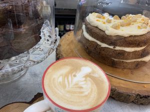 Flat white and carrot cake  at The Garden Kitchen in Ansty