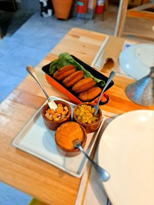 Acaraje with vatapa, caruru,  and salad at São Saruê in Sao Paulo