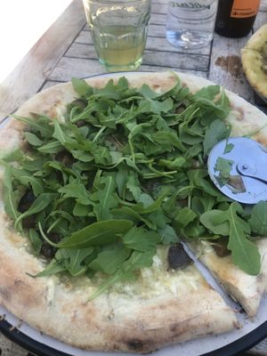 Forest pizza with vegan cheese   at A Vocados in Platja Daro