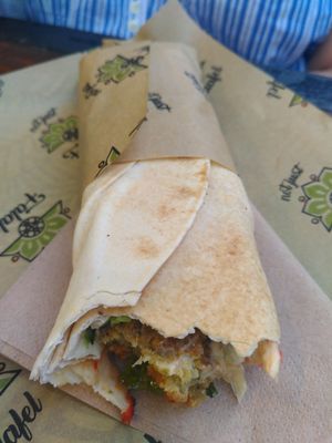 classic falafel (half eaten cause I was hungry...) at Not Just Falafel in Athens