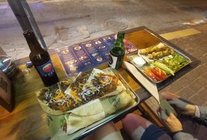 Lahmajoun (vegan), wrap with falafels and my friend's non vegan meal at Not Just Falafel in Athens