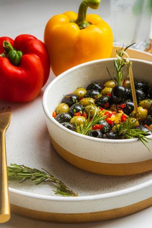 Marinated Olives - mixed pitted olives, salt coarse, fresh rosemary at LEGENDS - Bistro Bar and Sports in Canggu