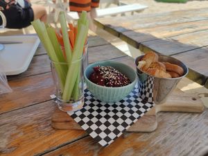 Hummus with breadsticks and veggies at Areal Beach Bar by Chakall in Lourinha