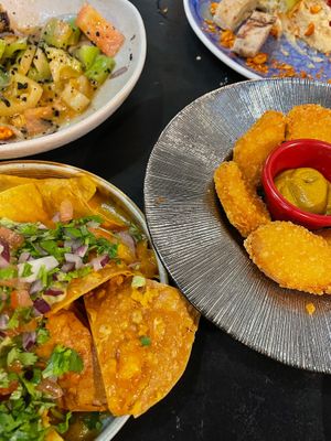 Nachos and vegan nuggets with a curry/mustard sauce  at Bar Tomeu in Sitges