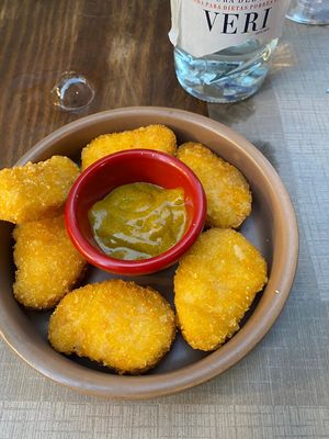 Vegan no chicken nuggets with a curry sauce.  at Bar Tomeu in Sitges
