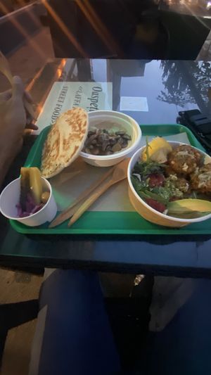 Hummus with mushrooms and falafel bowl  at Laffa Israel Street Food in Chisinau