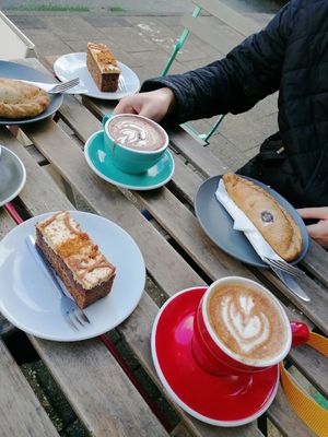Chai latte, hot chocolate, coffee, fake steak bake, biscoff cake. at FRÂN Las in Llanberis