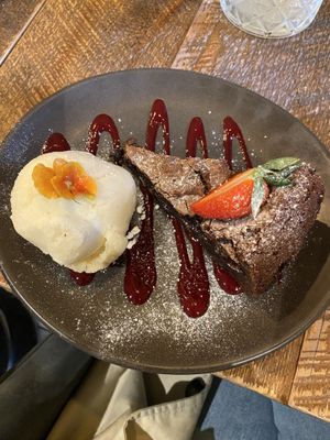 chocolate hazelnut brownie with vegan vanilla ice cream   at Coal & Cotton in Worsley