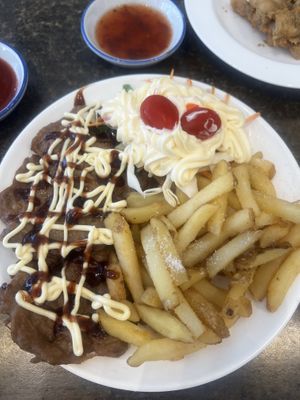 Vegan beef with salad (under the sauce!) and chips   at Karma Tea House in Wollongong