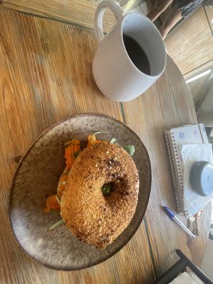 Coffee and bagel 🥯   at Pom Pom Bagels in Lagos