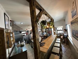 Sit at the bar   at Pom Pom Bagels in Lagos