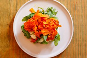 the plant-powered salmon: smoked carrots, vegan cream cheese and rucula at Pom Pom Bagels in Lagos