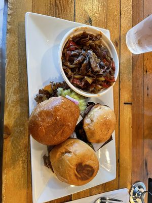 Bbq sliders and smothered cabbage 10/10  at COMMUNITY Kitchen + Taproom in Austin