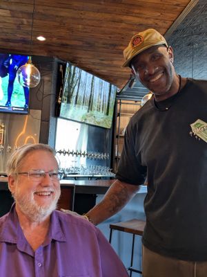 Congratulating the chef/owner at COMMUNITY Kitchen + Taproom in Austin