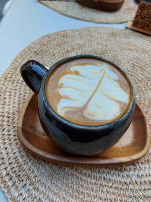 Latte with oat Milk : yummy (i asked for extra sugar) at Biomio Brunch Ecológico in Sevilla