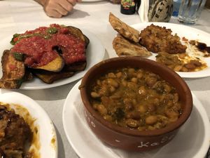 Mixed veg, chickpea pancake, pita and bean mix  at Katholiki Restaurant in Rhodes