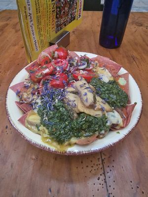 Vegan nachos with vegan cheese yum! at La Garrina Natural Wine Bar in Girona