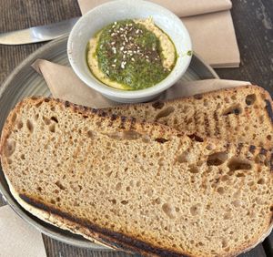 Hummus with pesto and sourdough  at Cafe On The Green in Widecombe In The Moor