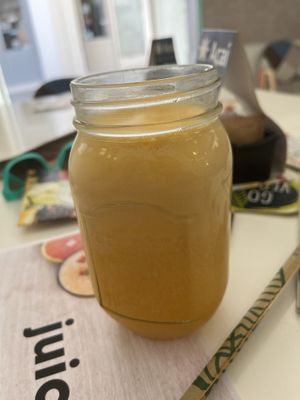 Fresh orange juice that was really foamy and delicious  at Juicy Point in Naxos