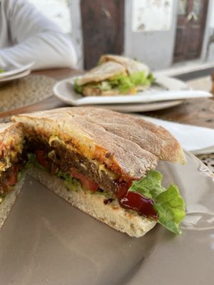 Blackbean Burger with vegan cheese at Pimpinelas Coffe Shop Vegetariano in Santa Cruz Madeira