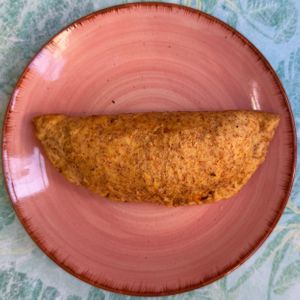 Vegan whole grain empanada with black beans and seitan. at Pimpinelas Coffe Shop Vegetariano in Santa Cruz Madeira