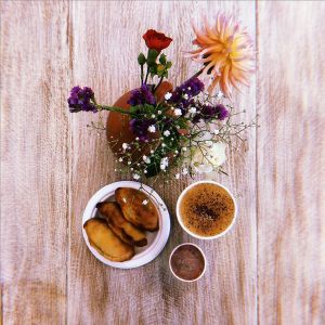 Cheese n' herb samosas with tomato chutney and a vegan cappuccino.  at The Big Drum in Canterbury