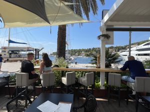 View to marina including super yachts at Forr Icy Bar in Hvar