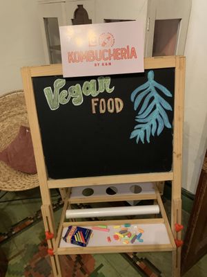 Sign inside at La Kombucheria in Merida