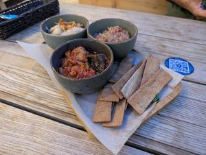 White bean dip and 2 types of eggplant dips with rye crackers at La Placinte - Ла Плэчинте in Chisinau