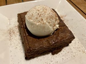 Chocolate brownie with ice cream  at Christopher's Kitchen in Palm Beach Gardens