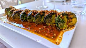 NYC Roll - Avocado, Kale, Almond Ginger Pate, Cucumber, Mango, Sprouts, Red Pepper, Collard Greens, Spicy NYC Sauce and Almond Crunchies Wrapped in Nori at Christopher's Kitchen in Palm Beach Gardens