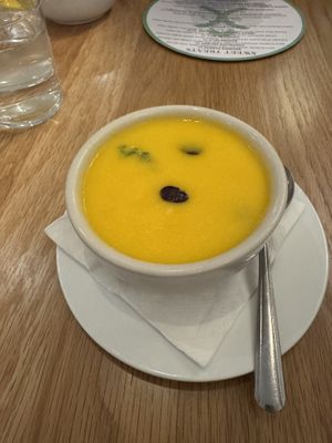 A cup of melon soup (cantaloupe, cucumber, and blueberries! I think with cilantro)  at Christopher's Kitchen in Palm Beach Gardens
