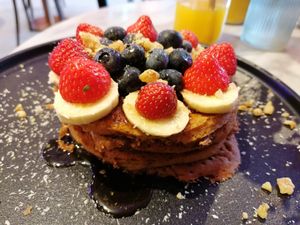 Vegan "Blue Bananas Stack". Absolutely delicious and super filling!! Unlimited maple syrup ;) at Blue Bananas in Groningen
