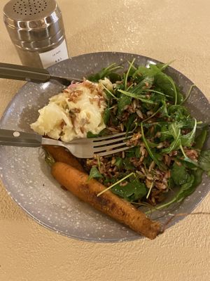 Wild salad rice with spinach and potatoes huancaina and grilled bio carrots at La Papa in Barcelona