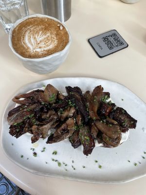 Mushroom toast & chai oat latte  at La Papa in Barcelona
