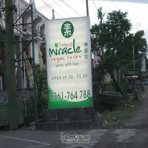 Street sign at Deity of Miracle Vegan Resto in Kuta