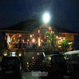 Front of restaurant (night view) at Deity of Miracle Vegan Resto in Kuta