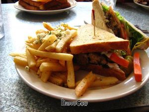 vegan pesto chicken sandwhich with garlic fries at Downbeat Diner and Lounge in Honolulu