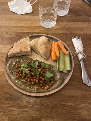 Vegan baba ghanoush with pita, chickpeas, carrots and concombres.   at Café Datel in Ceske Budejovice
