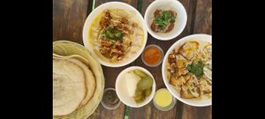 Top: crispy lemon califlower hummus, eggplant hummus at HaHummus HaNoded - החומוס הנודד in Maayan Baruch