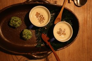 Half of first plate corn soup and edamame potato balls at Vegan French Restaurant L'Espéranceレスペランス in Sapporo